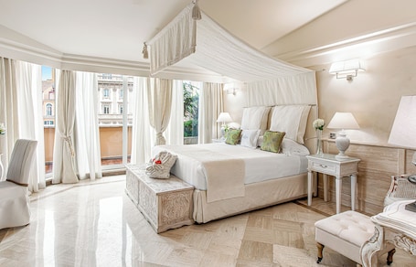 Down comforters, memory foam beds, minibar, in-room safe