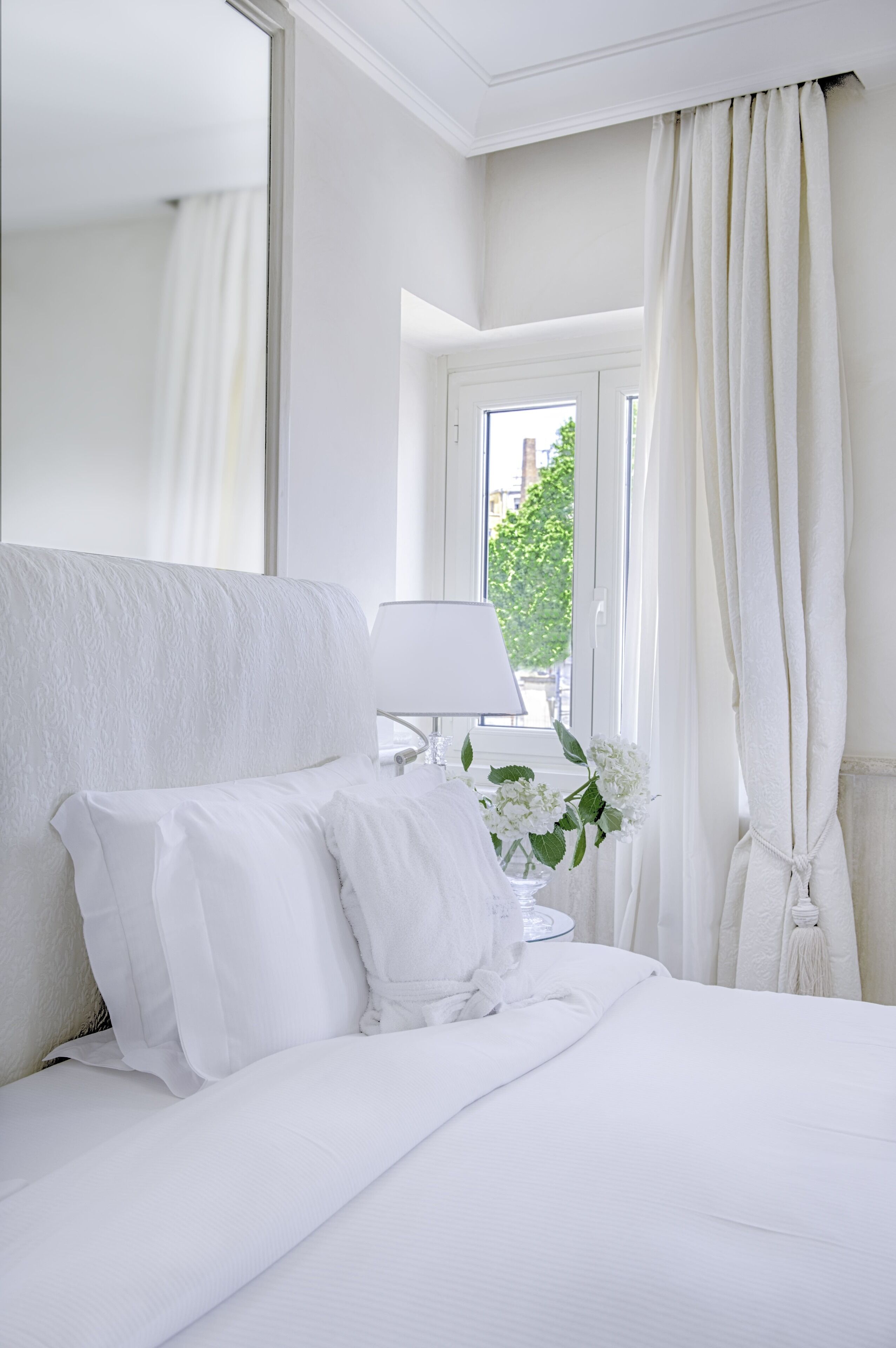 deluxe double room | down duvets, memory-foam beds, minibar, in-room safe