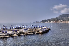 Private beach, black sand, beach cabanas, sun-loungers
