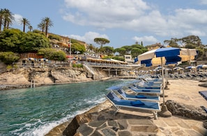 Private beach, black sand, beach cabanas, sun loungers