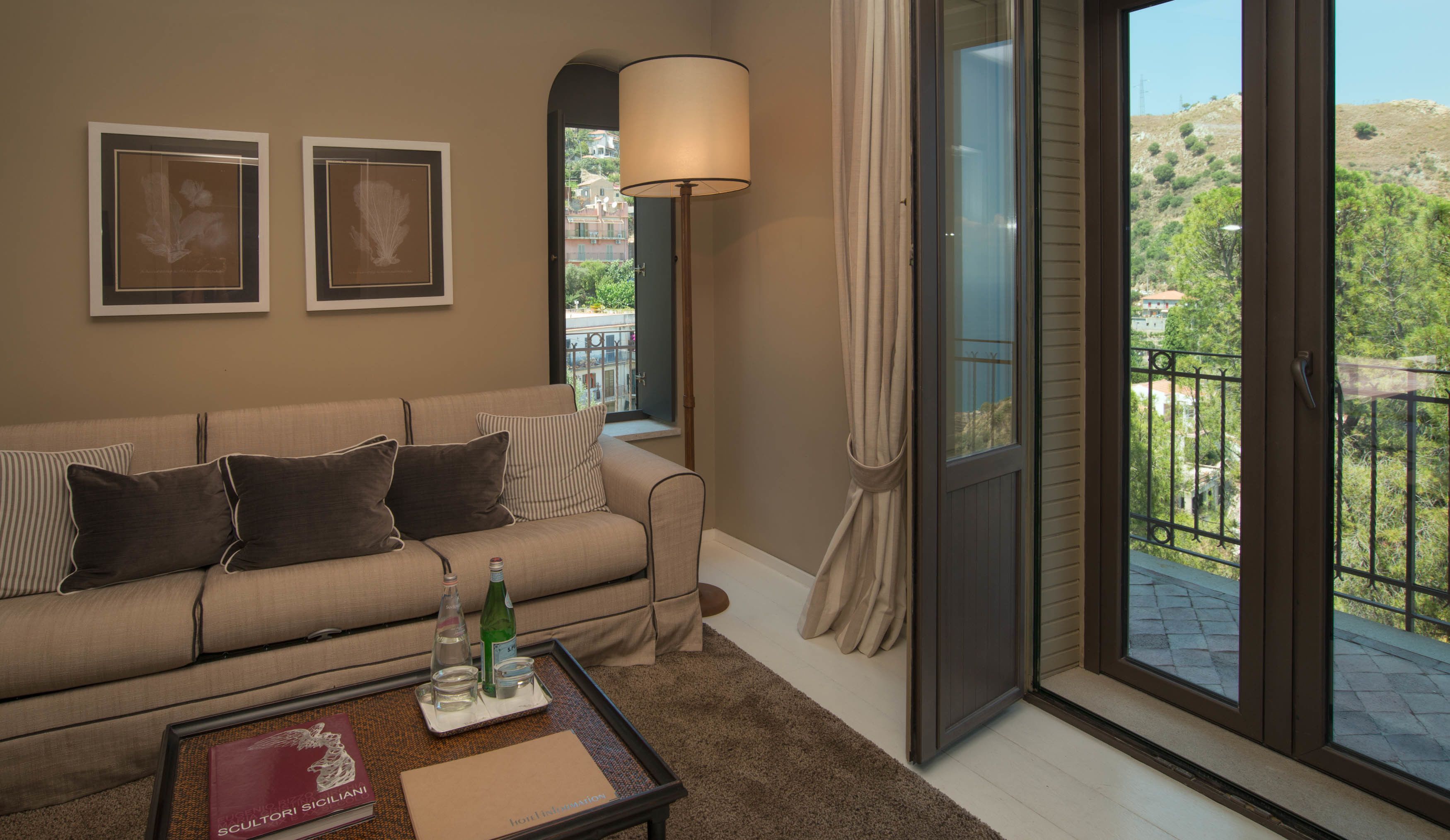 design suite, sea view | living area | 40-inch lcd tv with digital channels, tv, streaming services