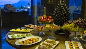 A buffet table with various desserts and fruits. - Hotel Villa Ducale (Taormina)