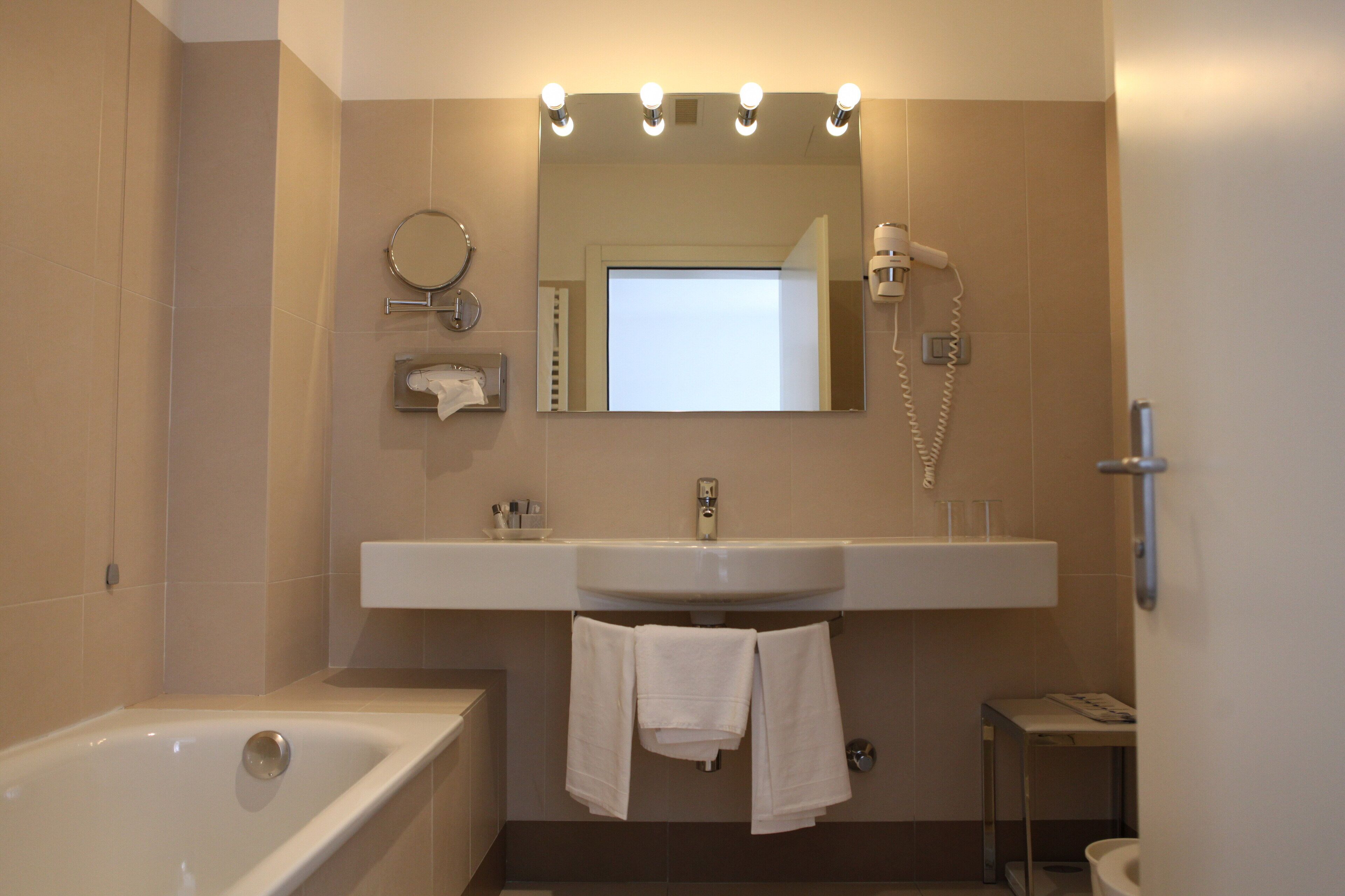 superior double or twin room | bathroom | rainfall showerhead, free toiletries, hair dryer, bidet