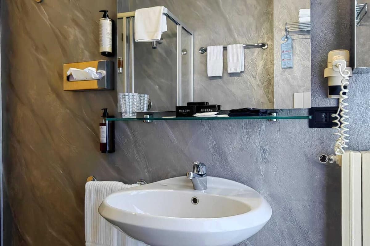 apartment | bathroom | shower, free toiletries, hair dryer, slippers