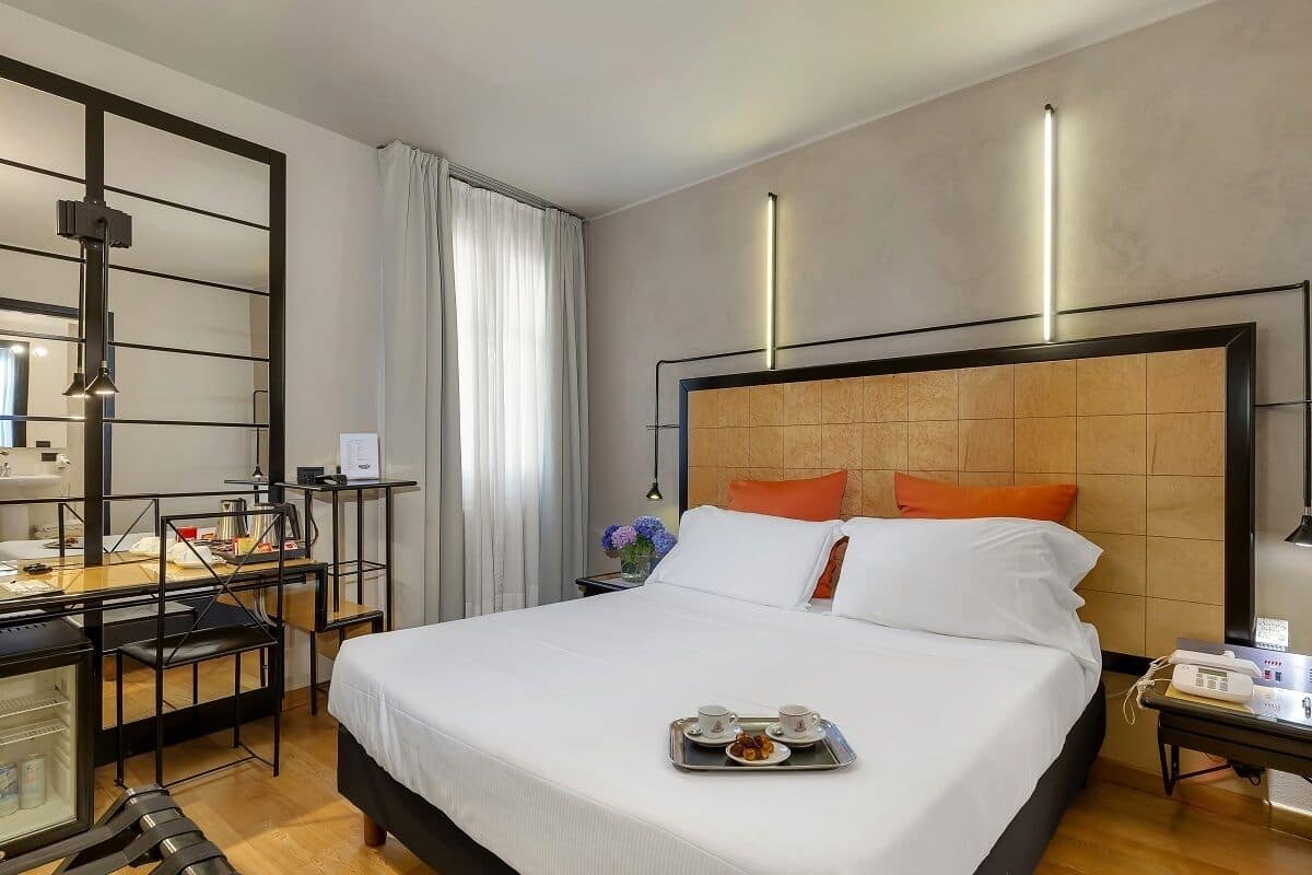 Economy Double Room, 1 Double Bed | 1 bedroom, minibar, in-room safe, desk