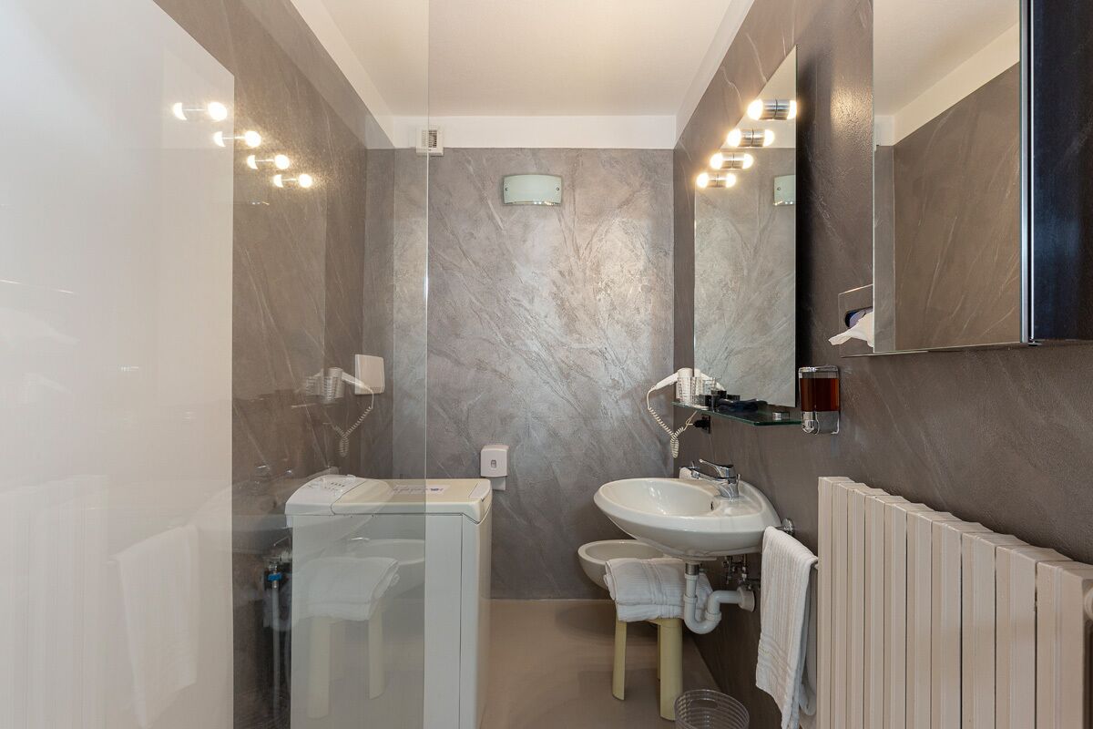 apartment | bathroom | shower, free toiletries, hair dryer, slippers