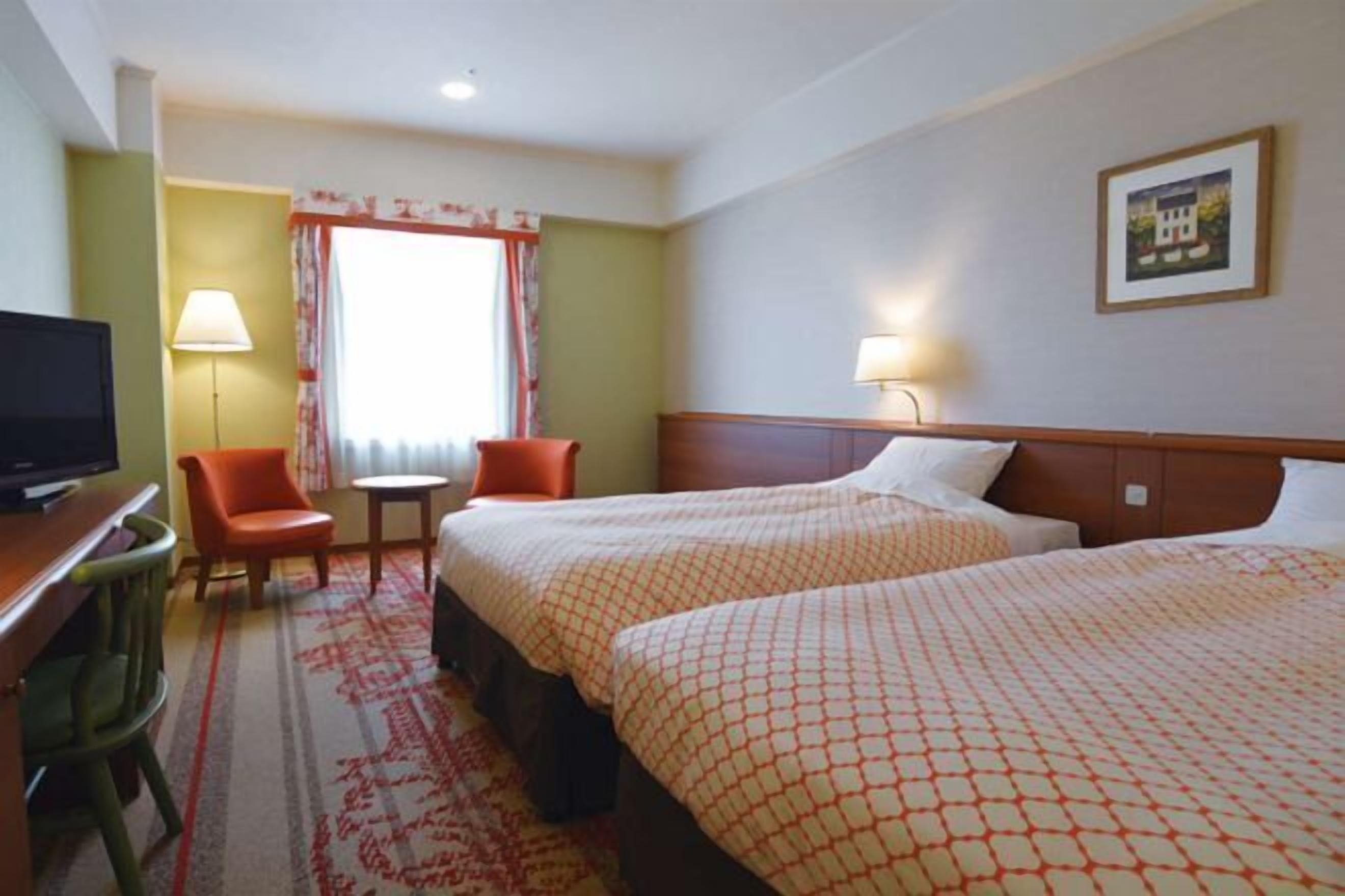 Premium bedding, down duvets, in-room safe, desk