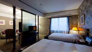 Premium bedding, down duvets, in-room safe, desk
