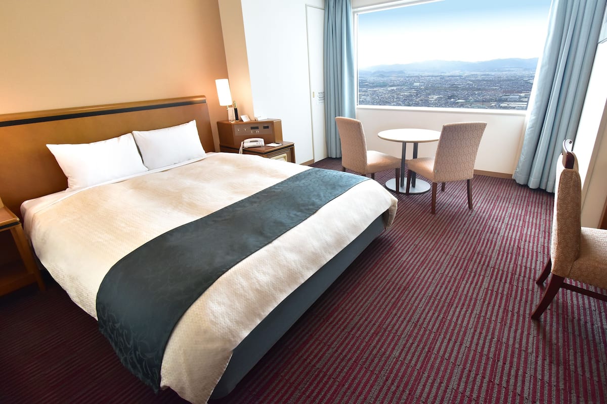 Double Room, Non Smoking (Airport Corner Double) | Down duvets, in-room safe, blackout curtains