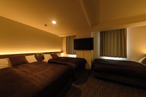 A hotel room with two beds, a flat-screen TV, and a window with curtains. - Hotel Sho Sapporo (ParkSide Hotel) (Sapporo)