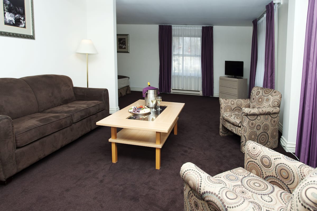 superior junior suite with bath | living area | lcd tv