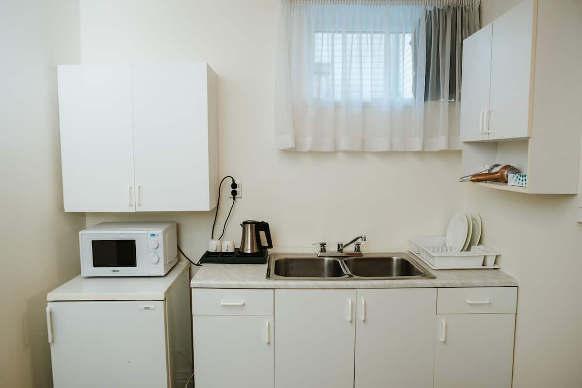 budget double room | in-room safe, desk, blackout curtains, iron/ironing board