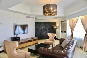 Minibar, coffres-forts dans les chambres, fer et planche à repasser