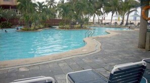 Outdoor pool, pool umbrellas, sun loungers