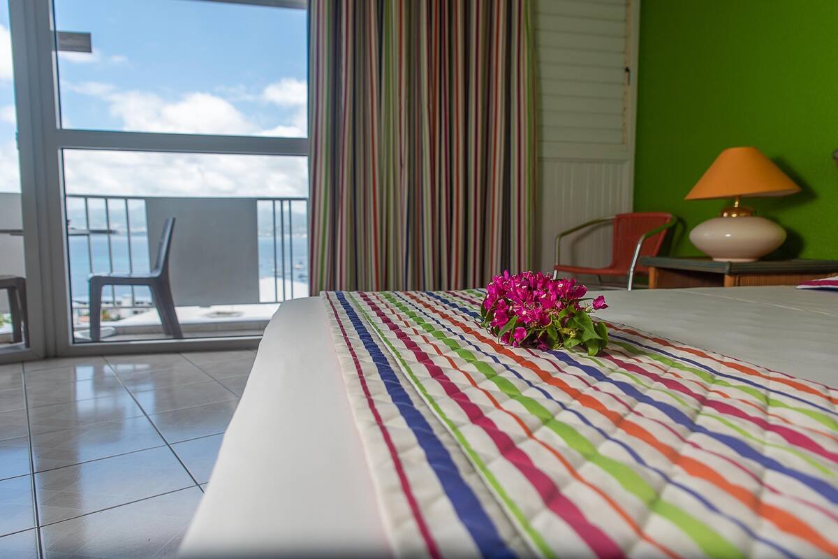 Desk, blackout drapes, cribs (free), WiFi (free)