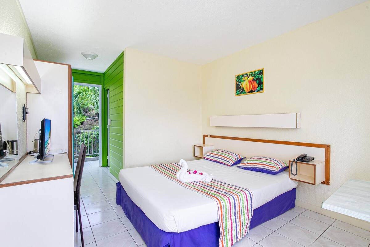 Desk, blackout drapes, cribs (free), WiFi (free)