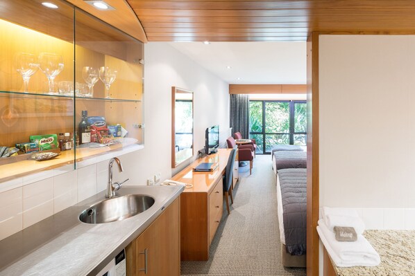 Premium Family Room (1 Queen and 2 Singles) | Private kitchen | Fridge, microwave, coffee/tea maker