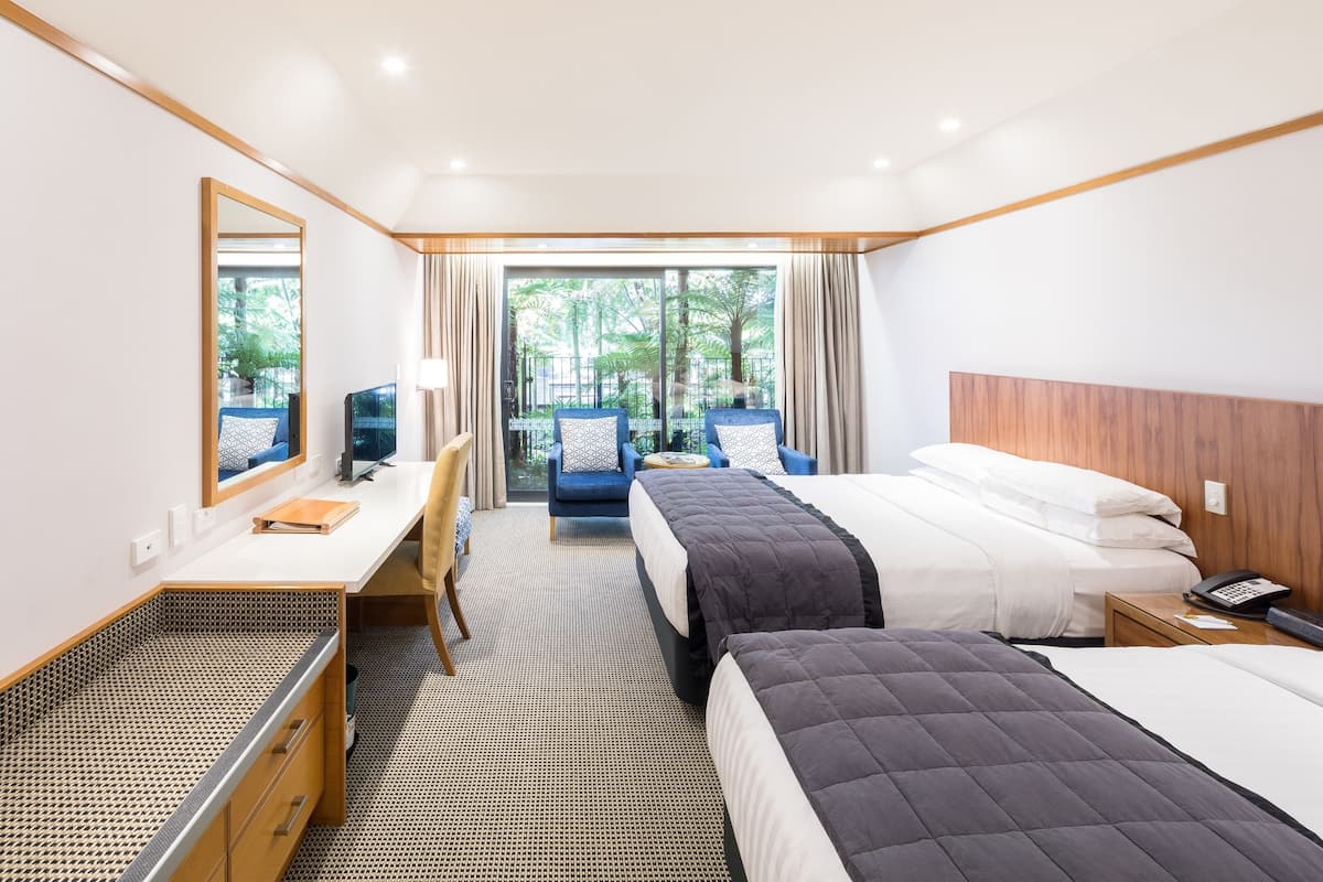 Habitación Premium con 2 camas individuales, 2 camas matrimoniales | Ropa de cama de alta calidad y minibar