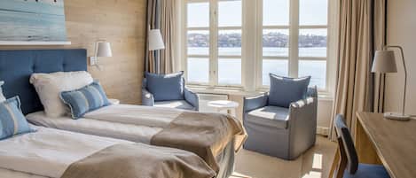 Desk, laptop workspace, iron/ironing board, cots/infant beds