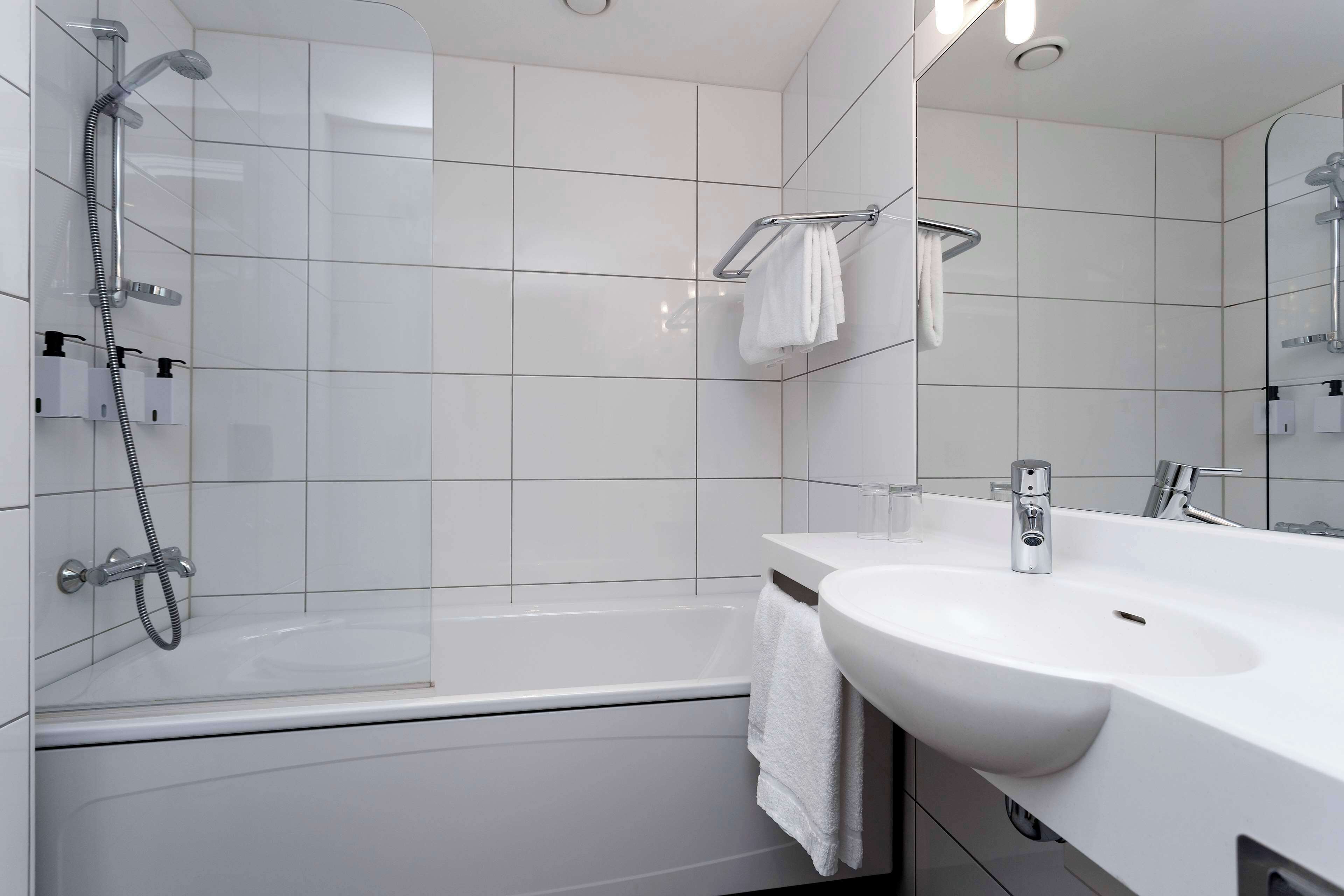 superior double or twin room | bathroom | shower, hair dryer, towels