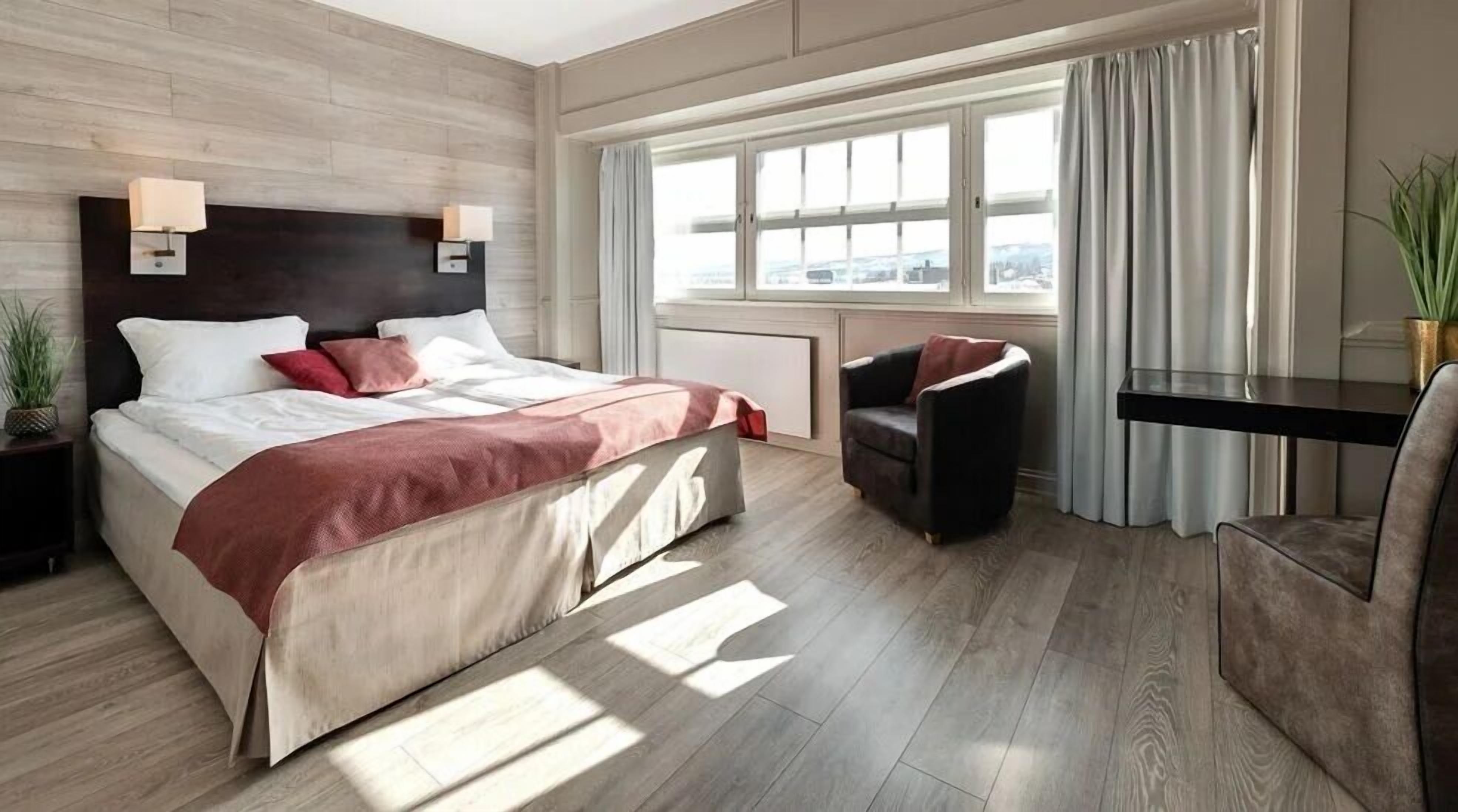 Premium bedding, pillowtop beds, desk, blackout drapes
