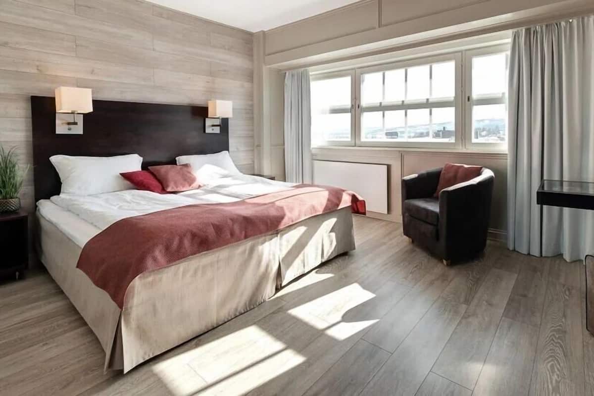 Premium bedding, pillowtop beds, desk, blackout drapes