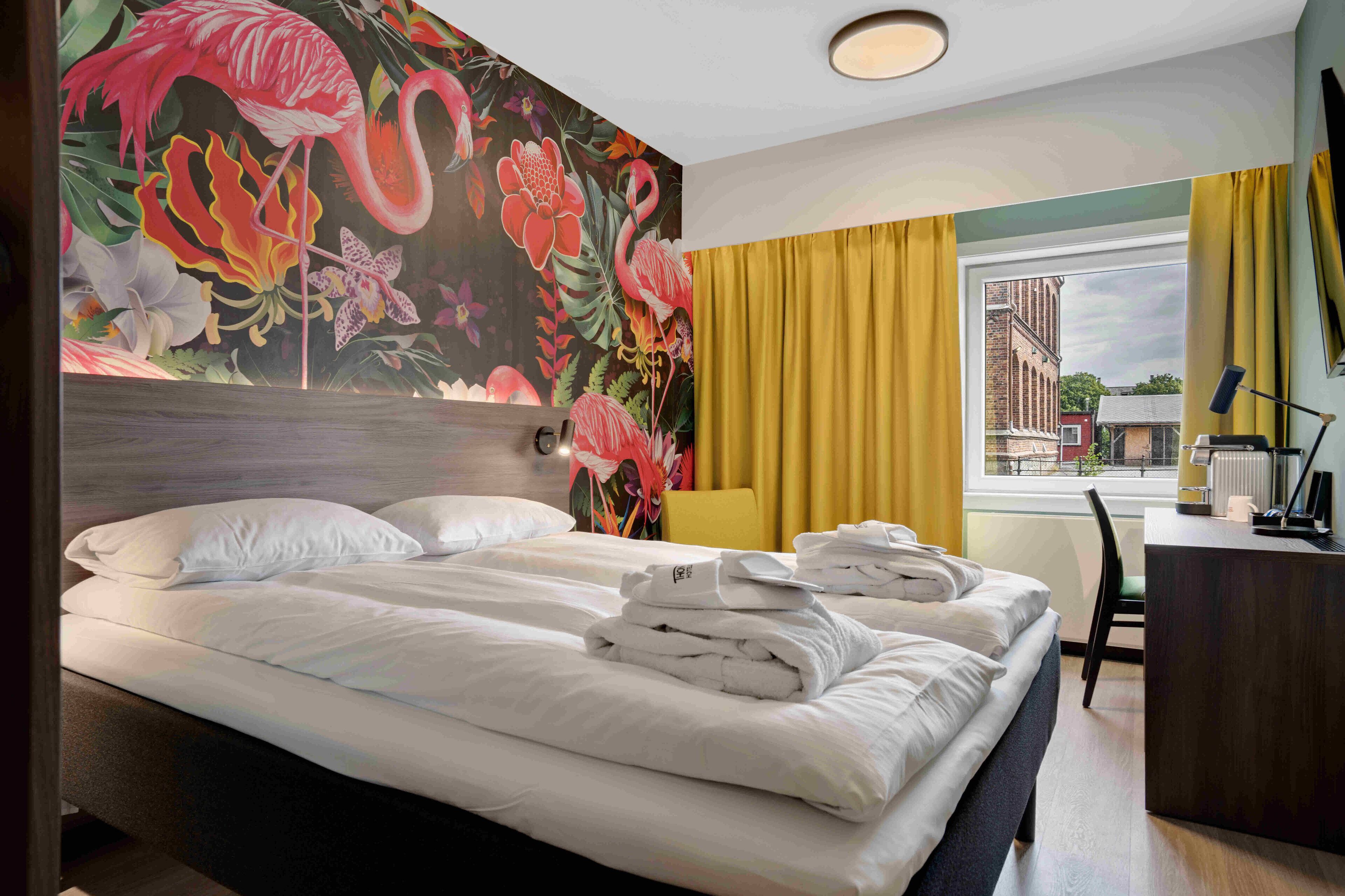 pillow-top beds, minibar, desk, blackout curtains