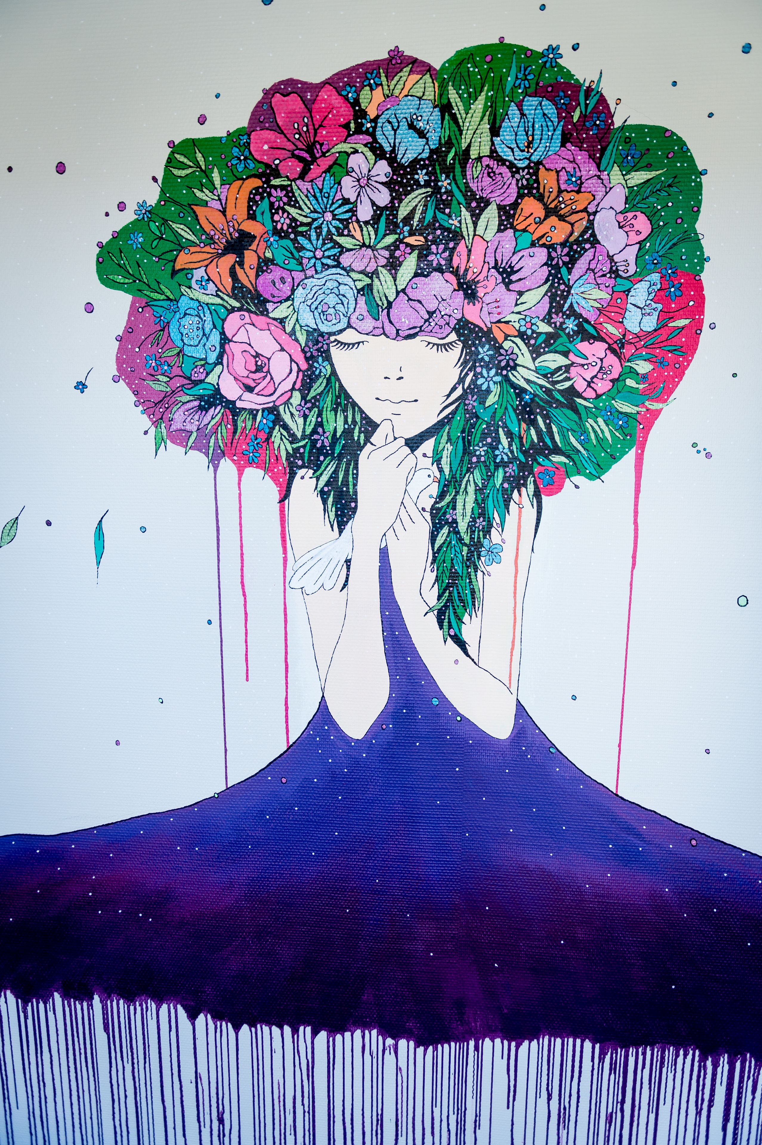 A person with a floral crown and a dark dress.