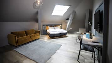 Familien-Vierbettzimmer, 1 Queen-Bett und Schlafsofa, Nichtraucher | Verdunkelungsvorhänge, kostenloses WLAN, Bettwäsche