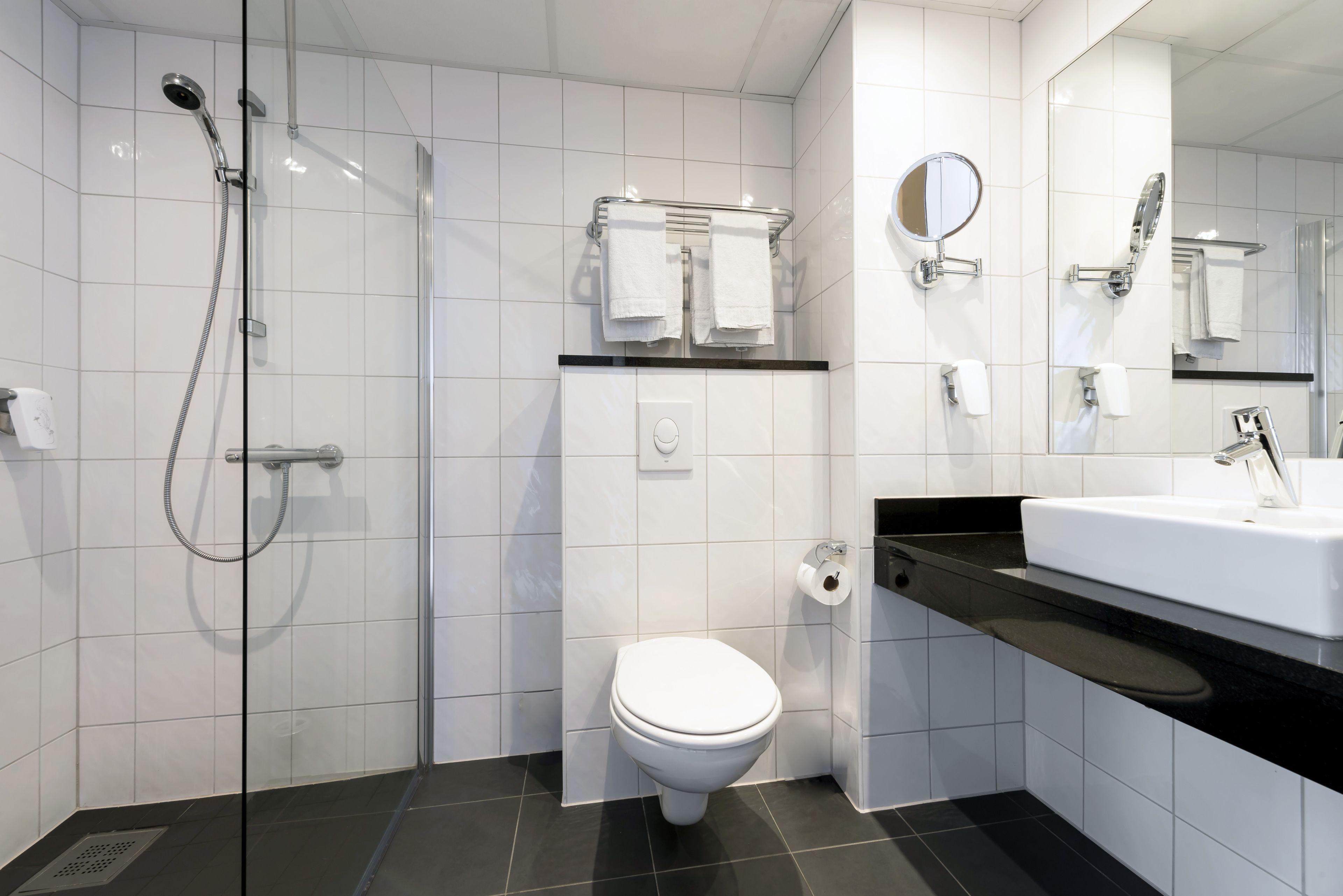 separate bathtub and shower, hair dryer, towels, soap