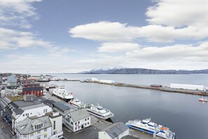Stunning coastal town with a marina and a mix of traditional and modern architecture.