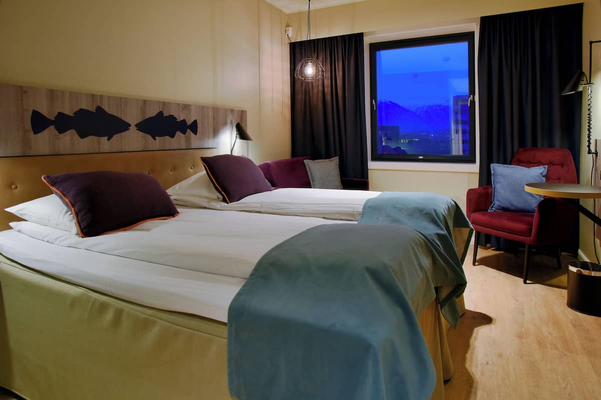 Laptop workspace, blackout curtains, free WiFi, bed sheets