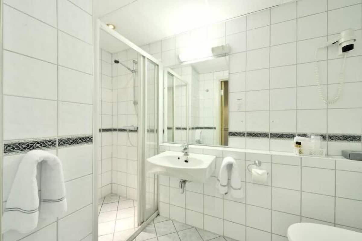Bathroom | Shower, hair dryer, towels
