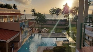 Outdoor pool, pool umbrellas, sun loungers