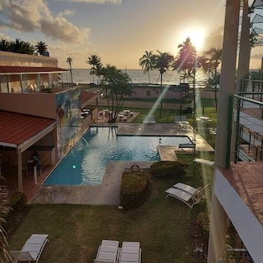 Outdoor pool, pool umbrellas, pool loungers