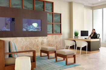 Hotel entrance and lobby at Embassy Suites by Hilton San Juan Hotel & Casino