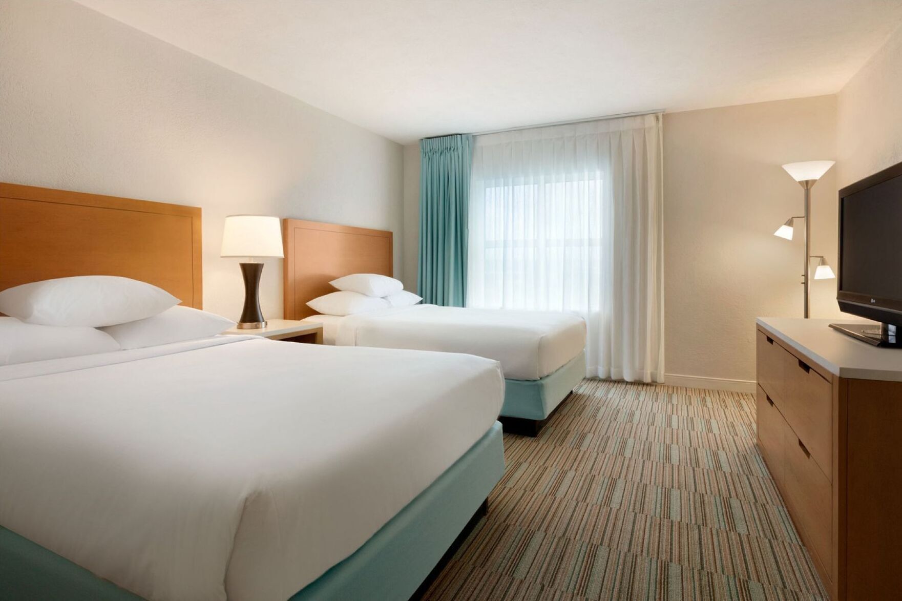 In-room safe, laptop workspace, blackout drapes, soundproofing