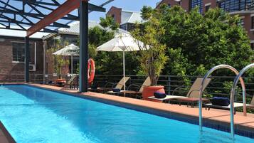 Outdoor pool, open 7:00 AM to 7:00 PM, pool umbrellas, sun loungers