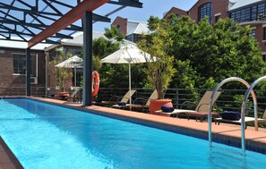 Outdoor pool, open 7:00 AM to 7:00 PM, pool umbrellas, sun loungers - Garden Court Victoria Junction (Cape Town)