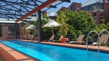 Outdoor pool, open 7:00 AM to 7:00 PM, pool umbrellas, sun loungers