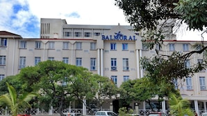 A hotel with a modern facade, multiple windows, and a sign reading "BALMORAL". - The Balmoral Hotel (Durban)