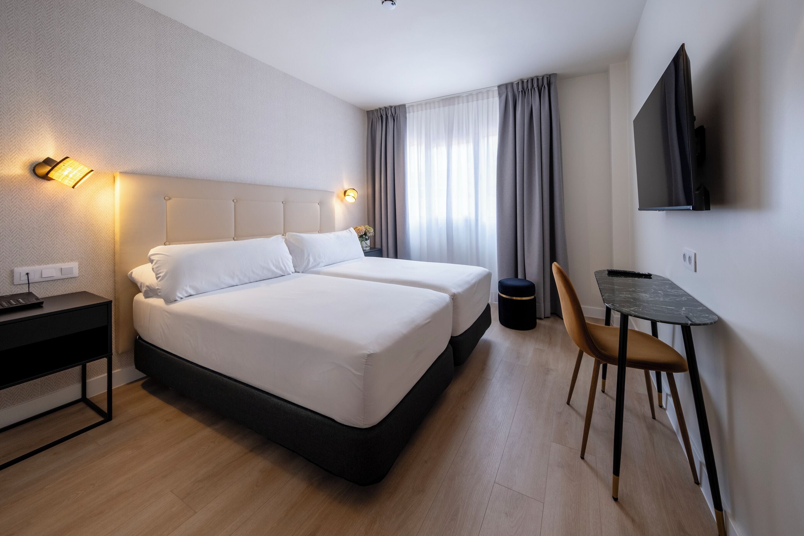 deluxe room | 1 bedroom, in-room safe, desk, blackout curtains