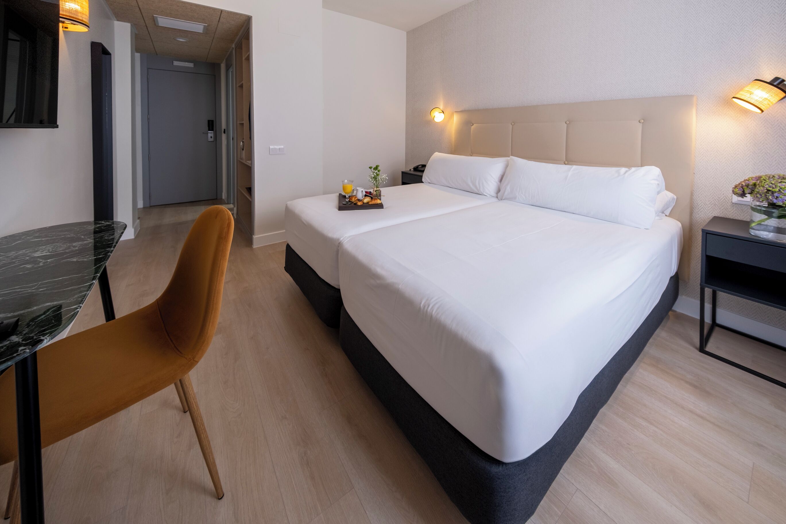 deluxe room | 1 bedroom, in-room safe, desk, blackout curtains