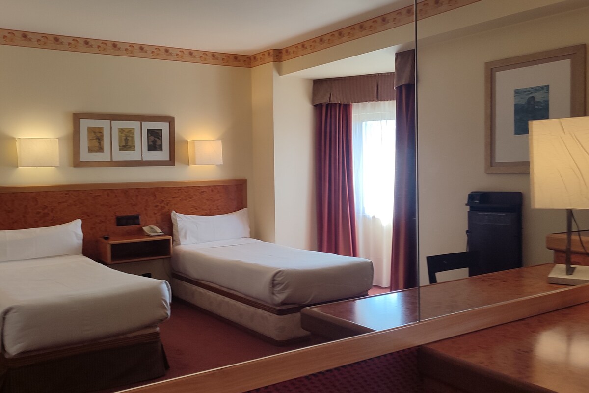 Hypo-allergenic bedding available, minibar, in-room safe, desk
