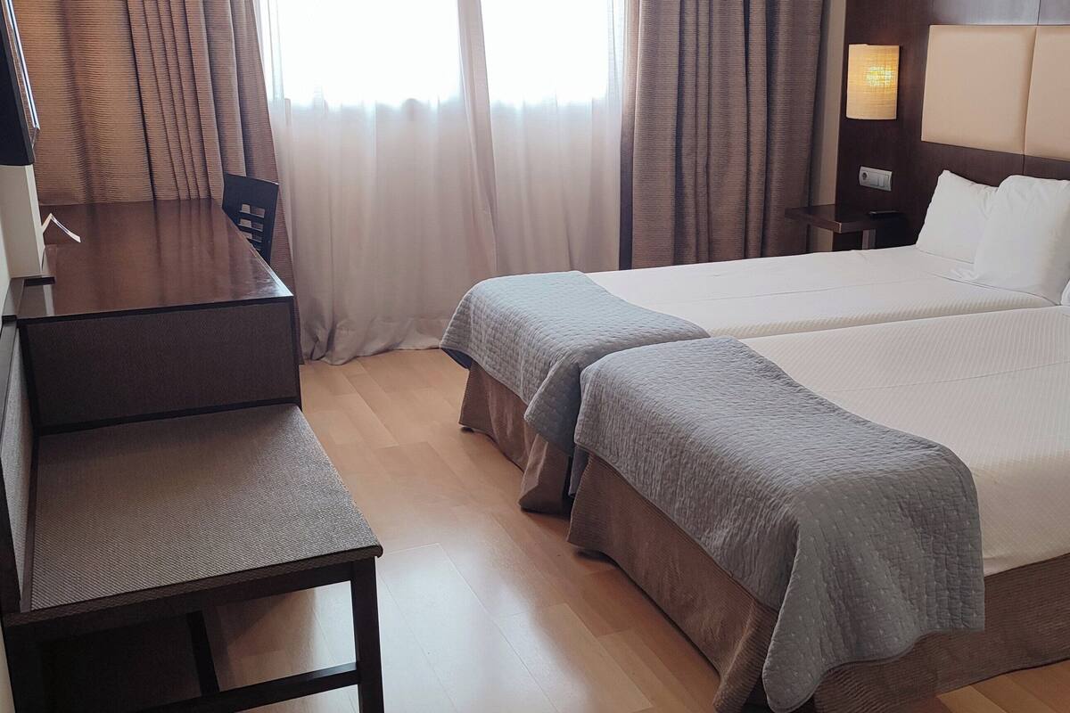 Hypo-allergenic bedding available, minibar, in-room safe, desk