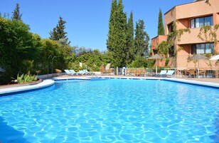 Seasonal outdoor pool, open 11 AM to 8 PM, pool umbrellas, sun loungers