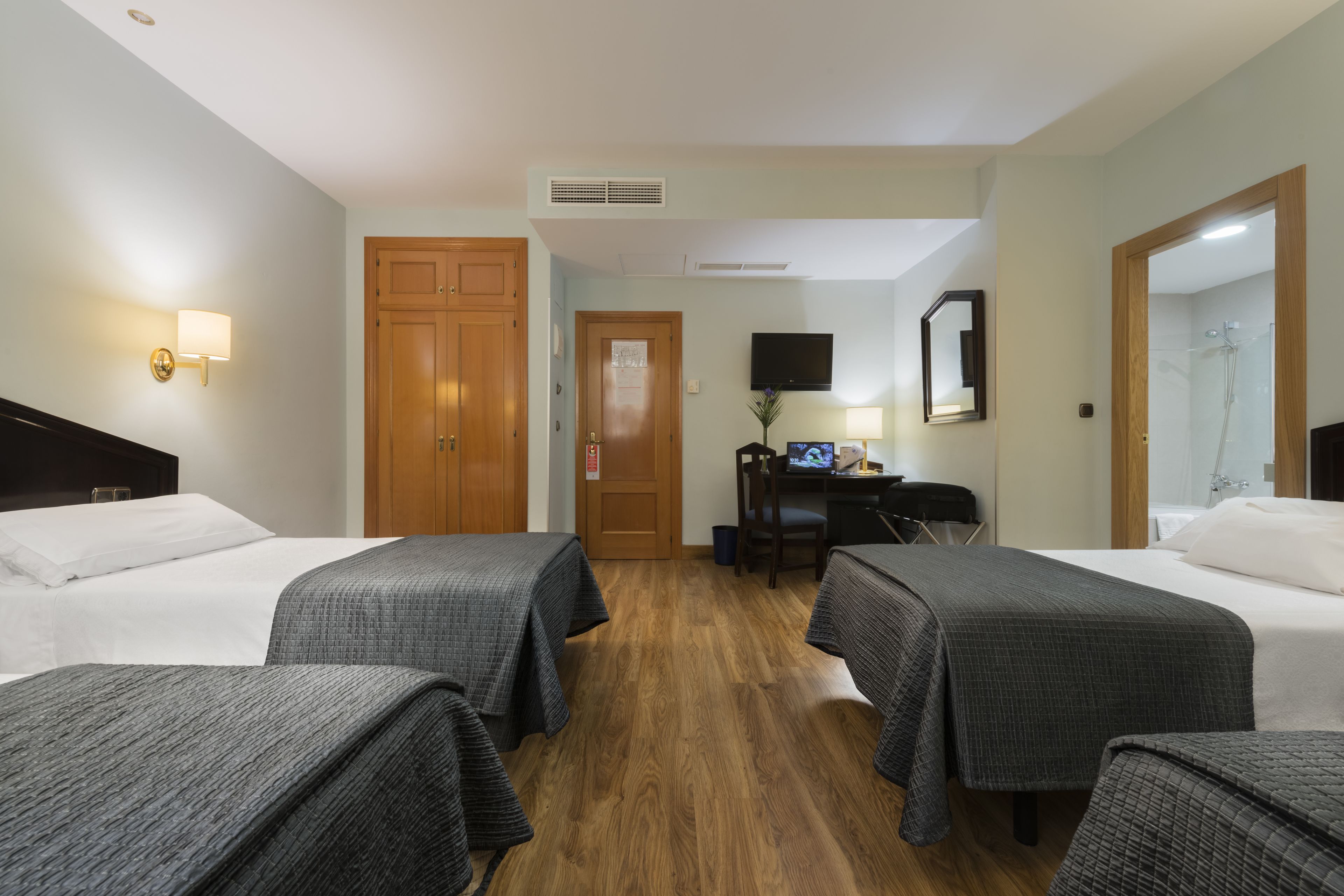 family room | minibar, in-room safe, desk, laptop workspace