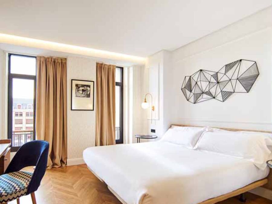 Down comforters, minibar, in-room safe, desk