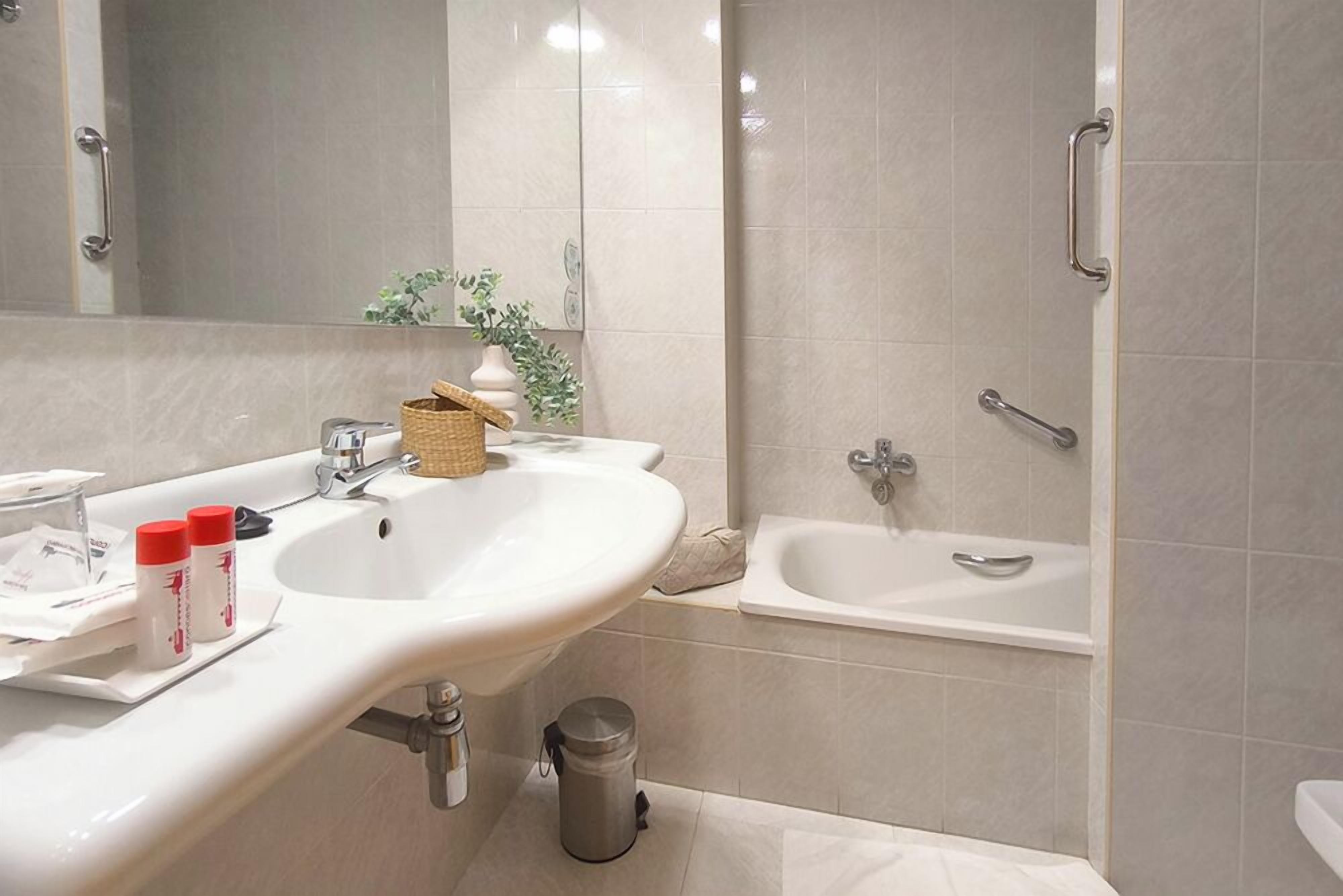 hair dryer, bidet, towels