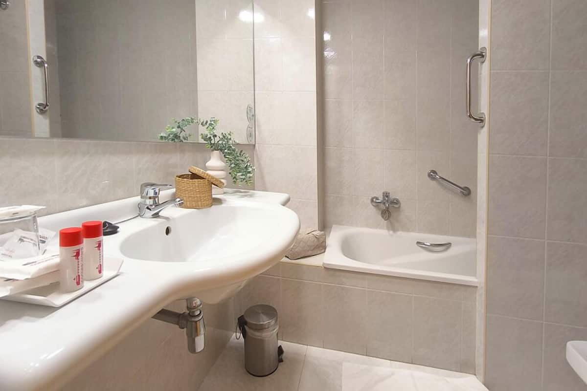 hair dryer, bidet, towels